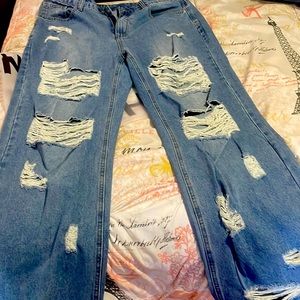 Ripped wide leg high wasted jeans.